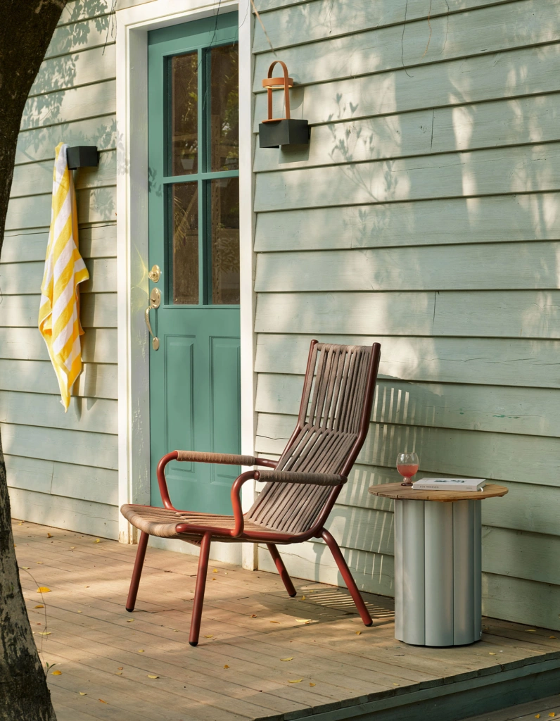 Loop Highback Lounge Armchair on an outdoor terrace